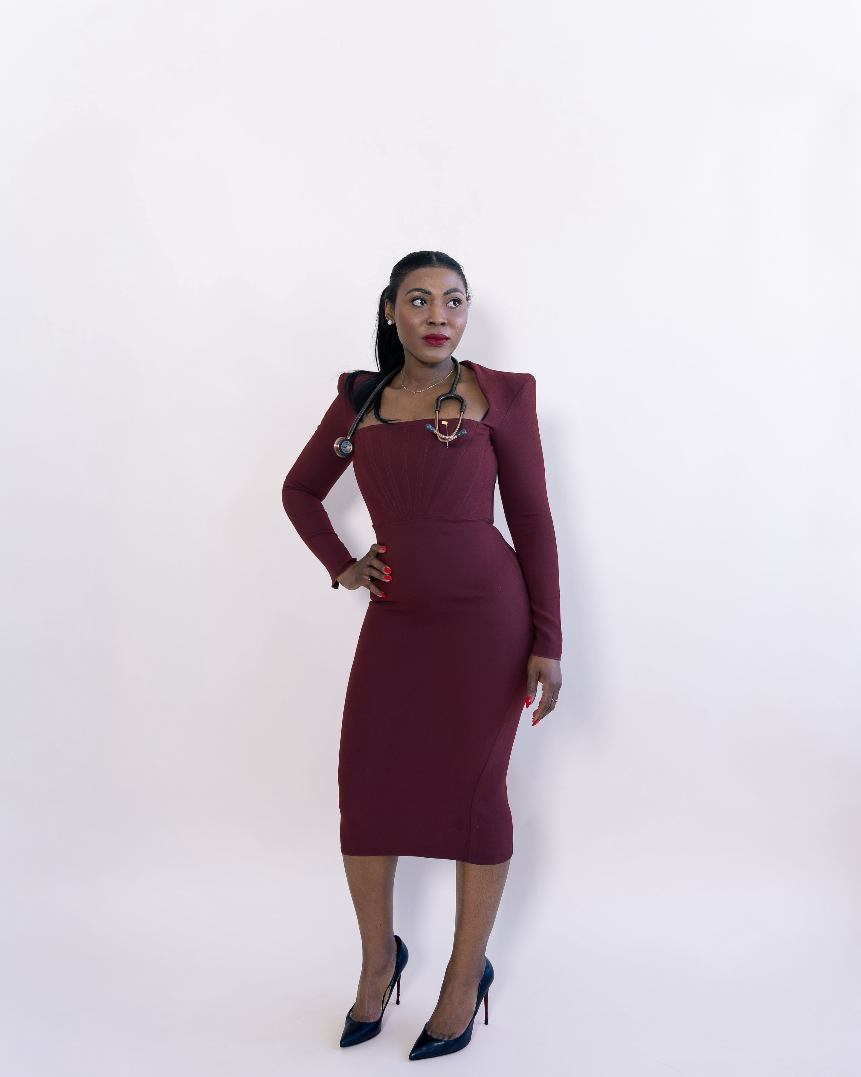 Lois Akumeh in red dress