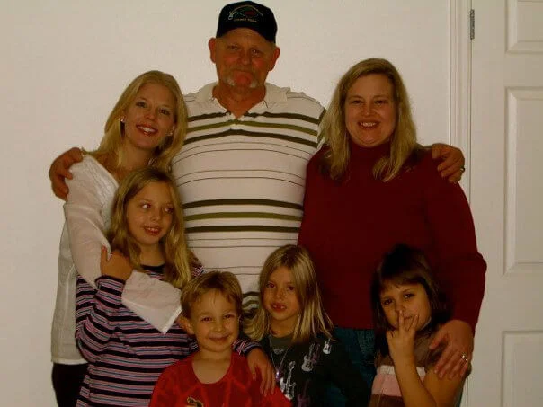 Dorcy with her father, sister, and children after their family reunification.