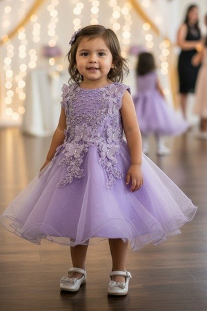 Lilac butterfly applique tulle baby dress style 9156B at Rilena's Boutique San Antonio