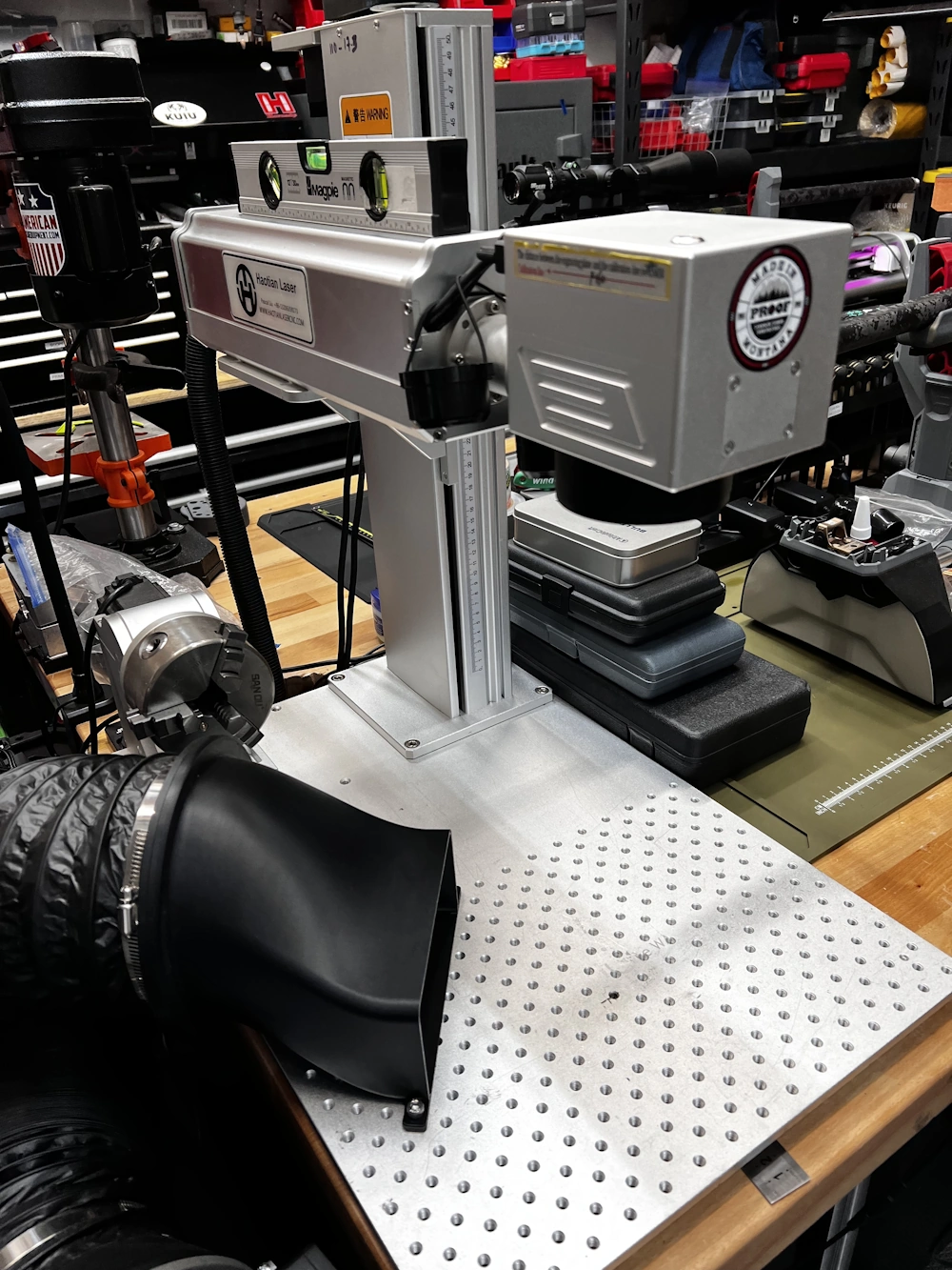 Laser engraving equipment at Precise Arms in Bellevue, Washington.