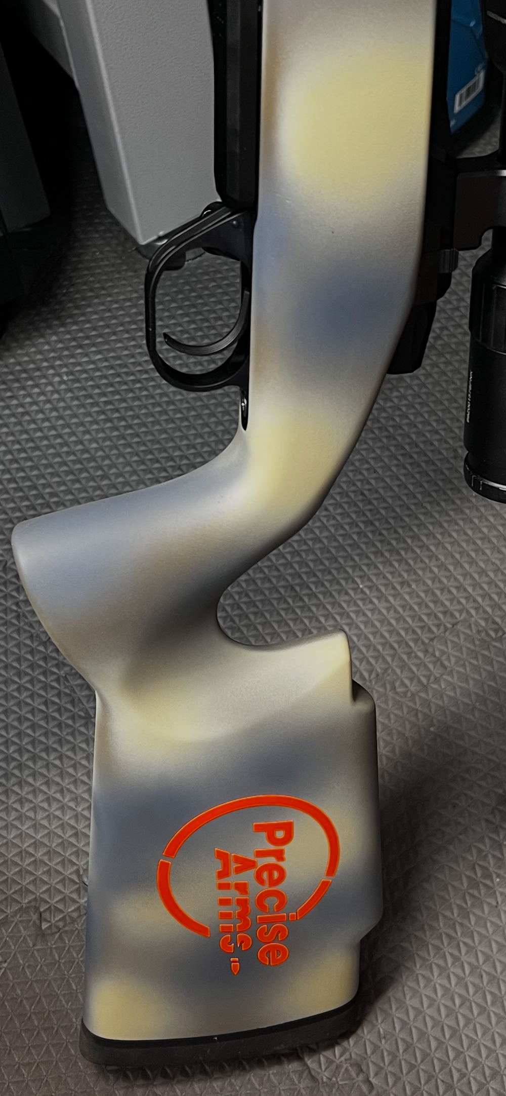 Custom Cerakote finish with Precise Arms branding on a rifle stock.