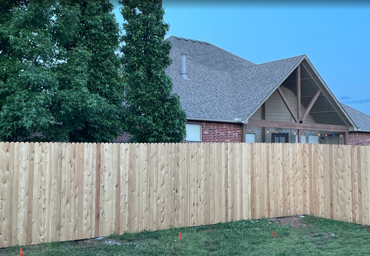 Custom cedar privacy fence installation and residential roofing in Tulsa, Oklahoma