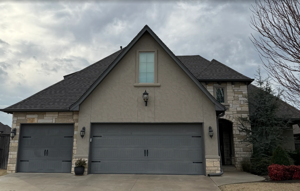 New roof replacement on a stone and stucco home in Broken Arrow, Oklahoma