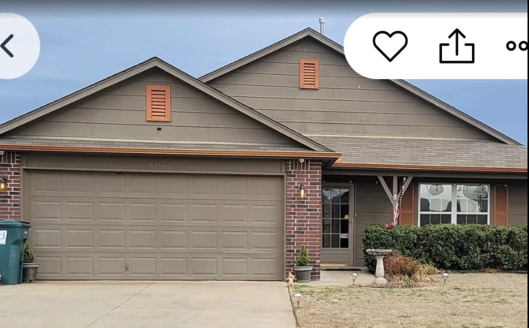 Owasso home before siding replacement and exterior painting