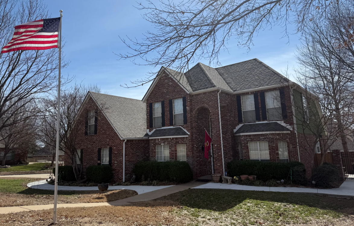 Beautiful new roof replacement on a large brick home in Tulsa, OK