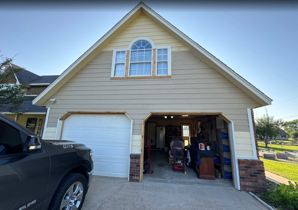 Owasso garage siding replacement and exterior painting in progress