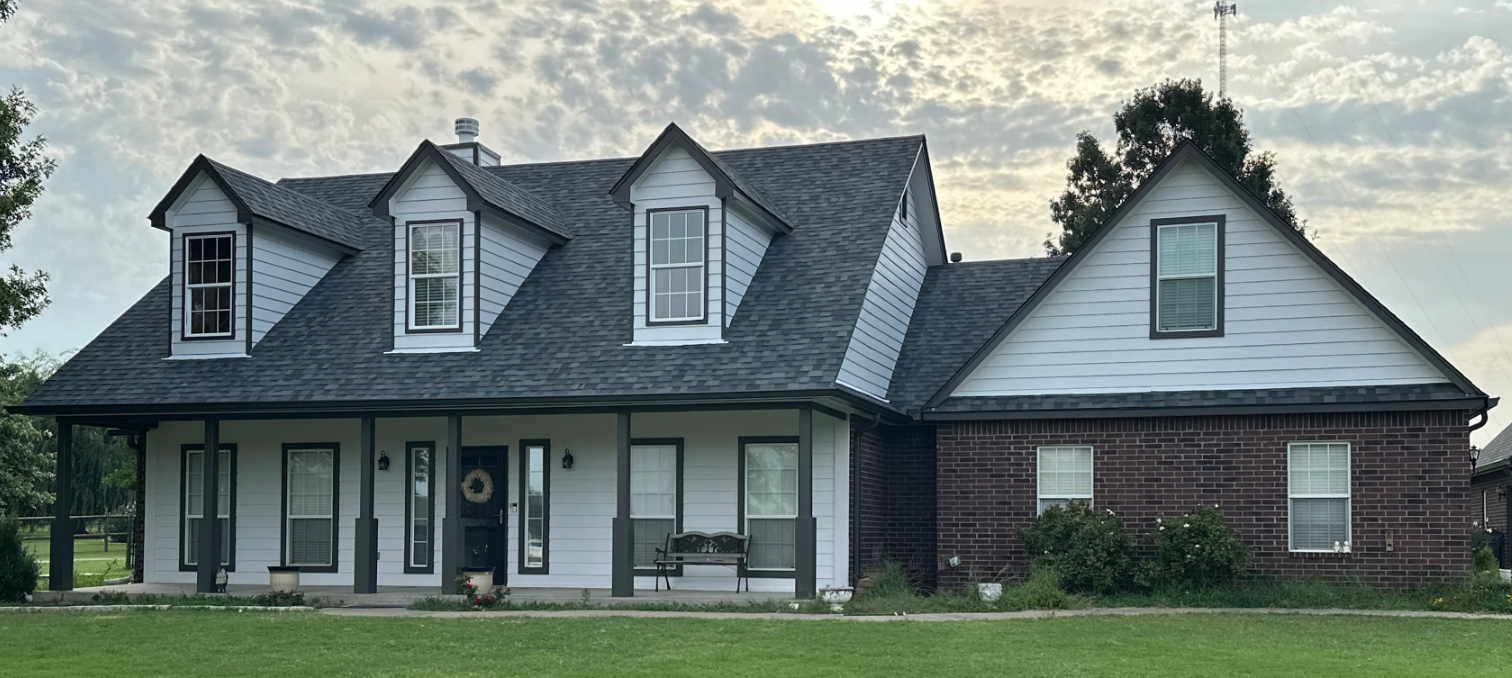 Owasso home after new roof installation and exterior painting