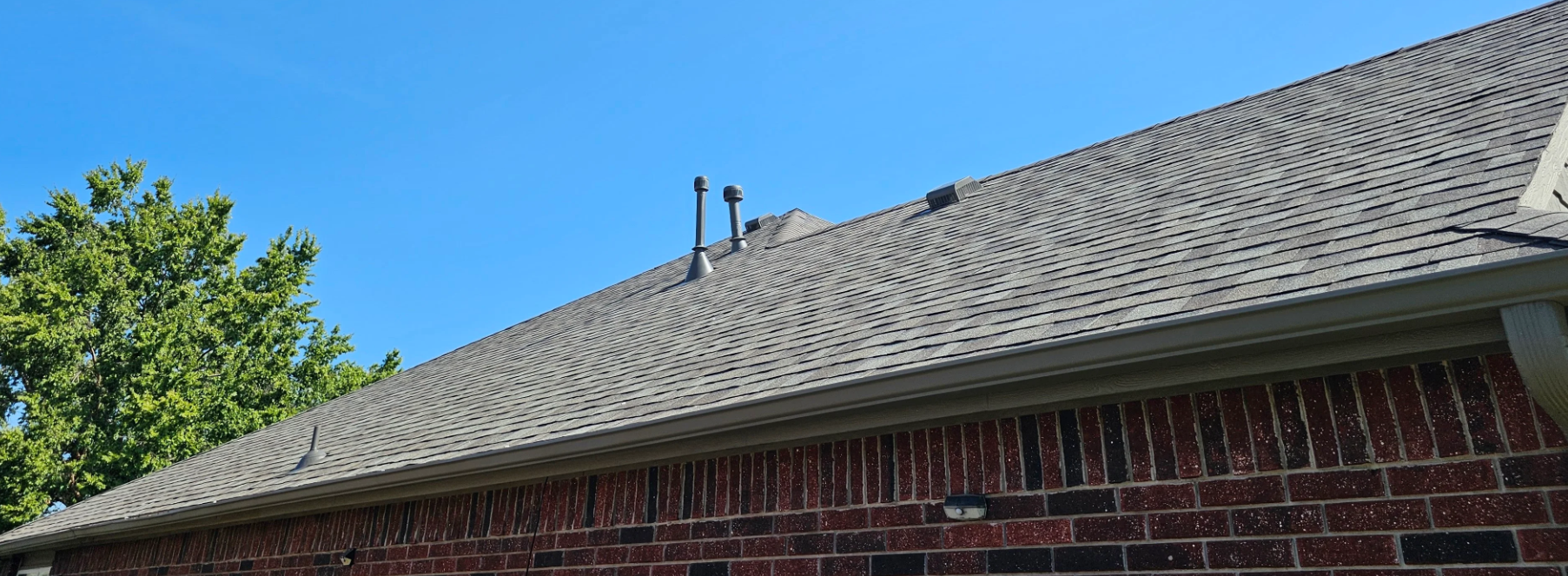 New roof installation on a brick home in Broken Arrow, Oklahoma