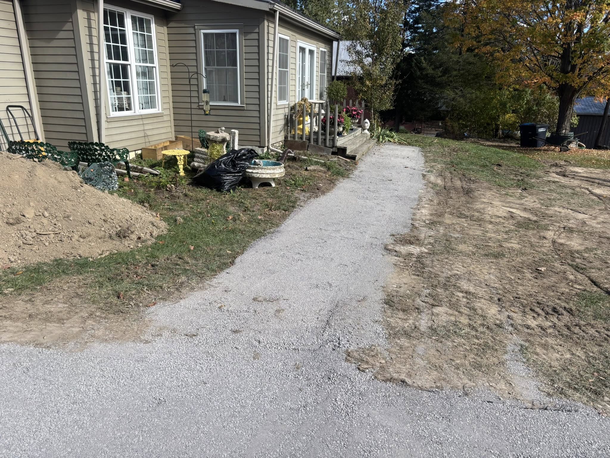 Gravel path site prep next to house