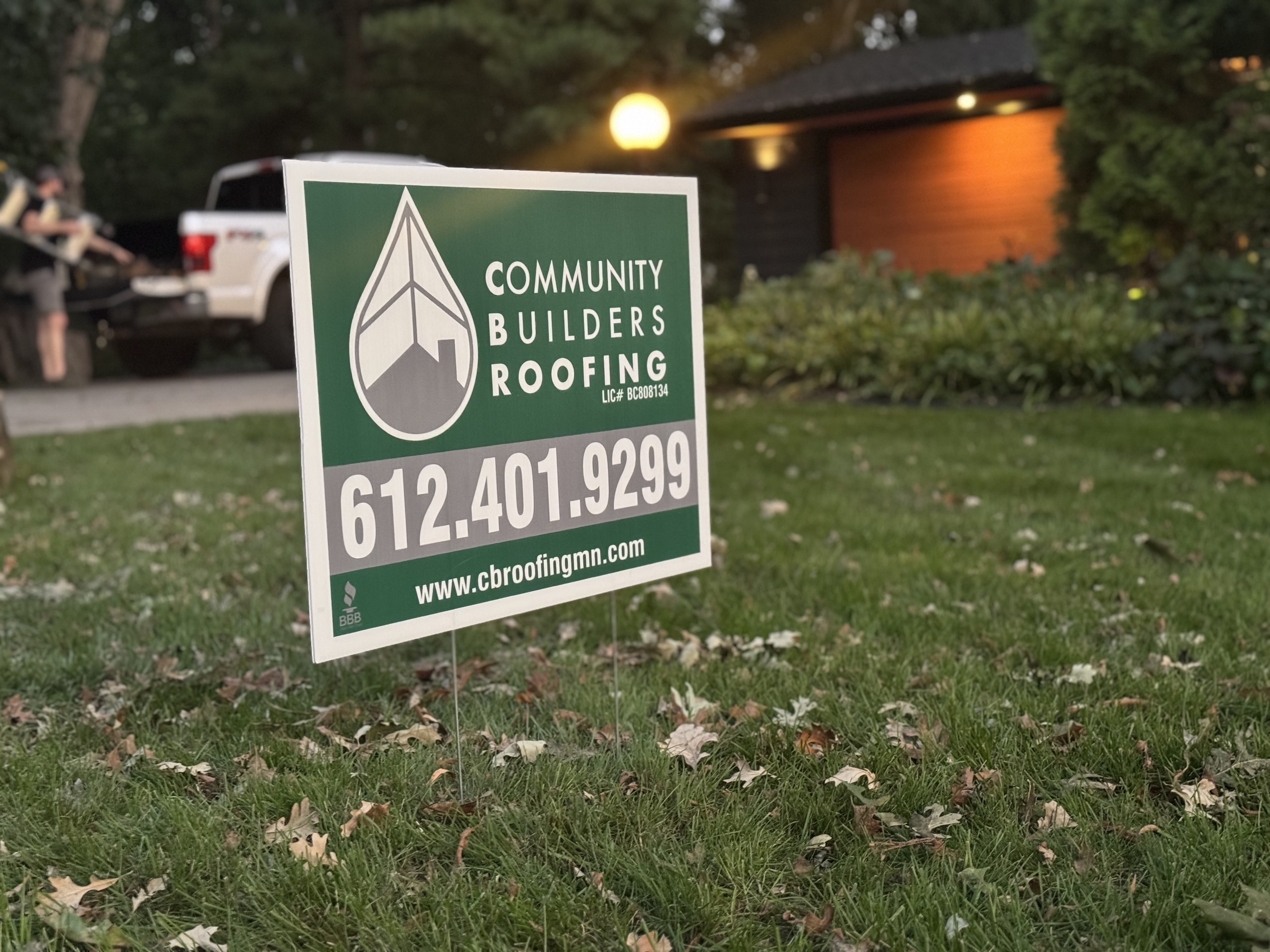 Community Builders Roofing yard sign in front of a home in Cottage Grove, Minnesota