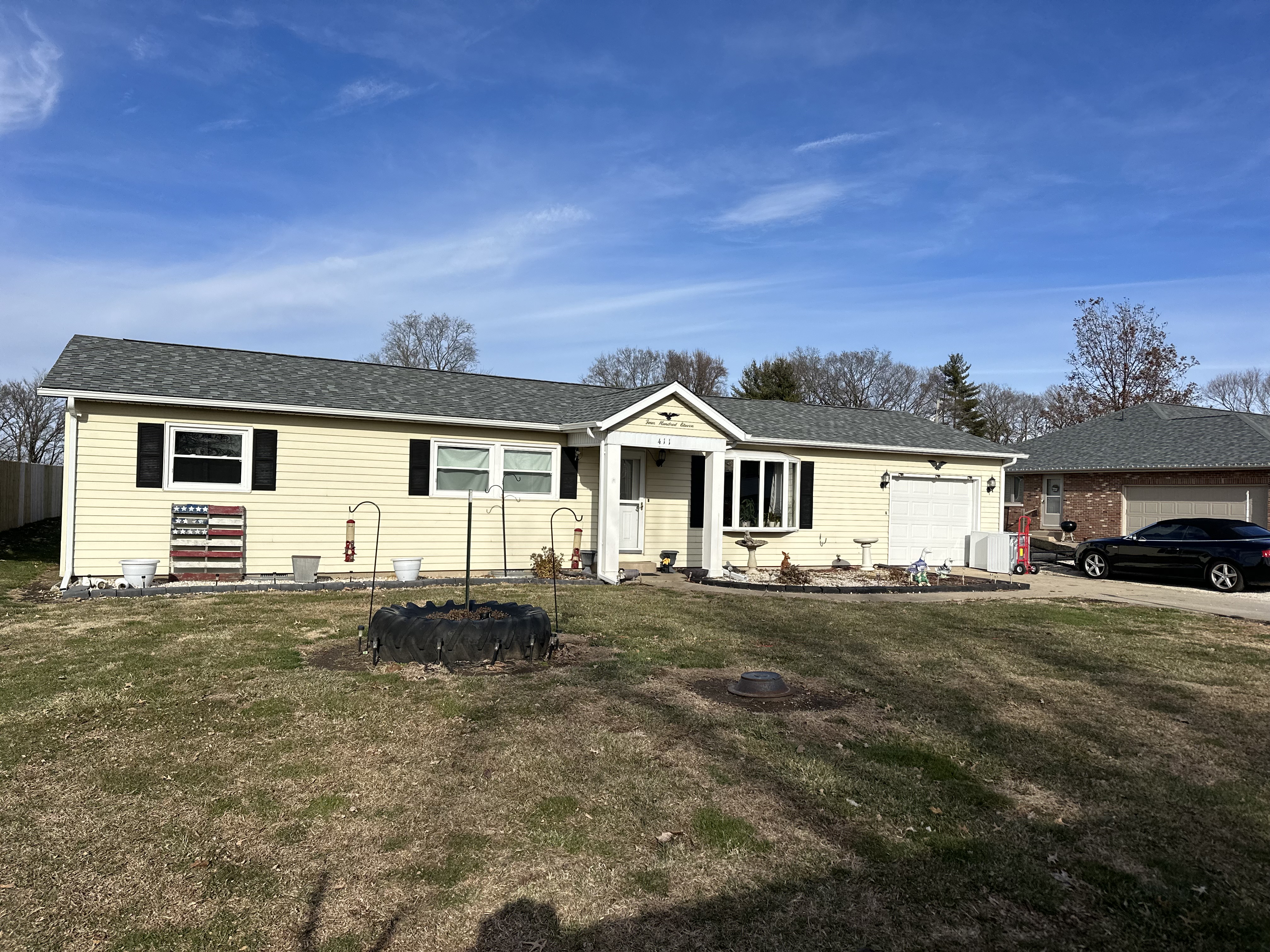 Yellow ranch home — New gutters and downspouts installed. in Central IL
