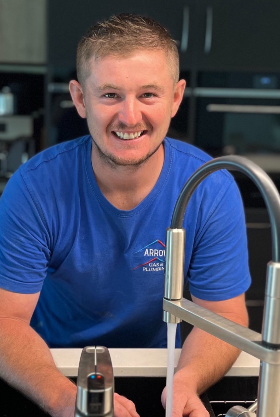Plumber working on a sink