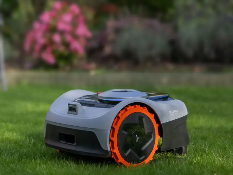 Robotic mower navigating slopes