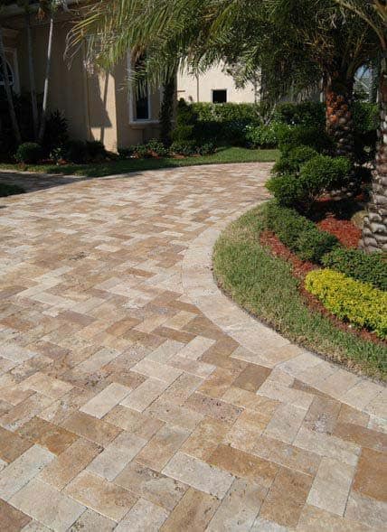 Stamped concrete driveway transformation with slate texture pattern in Oak Park