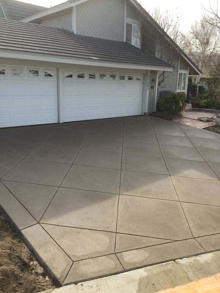 Covered patio structure with outdoor ceiling fan and lighting in Westlake Village