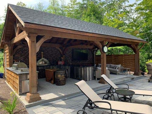 Straight-run outdoor kitchen island with granite countertops and grill in Camarillo
