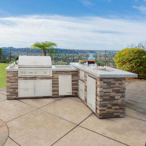 Architectural timber pergola shade structure over travertine patio pavers in Moorpark estate backyard