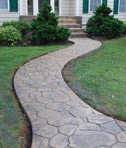 Paver patio with custom border detail and low-voltage illumination in Port Hueneme
