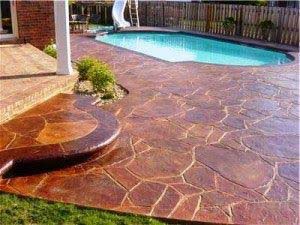 L-shaped outdoor kitchen counter with beverage center and granite bartop in Moorpark