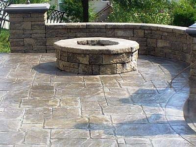 Poolside fire pit area with stone steps in Ventura hill estate