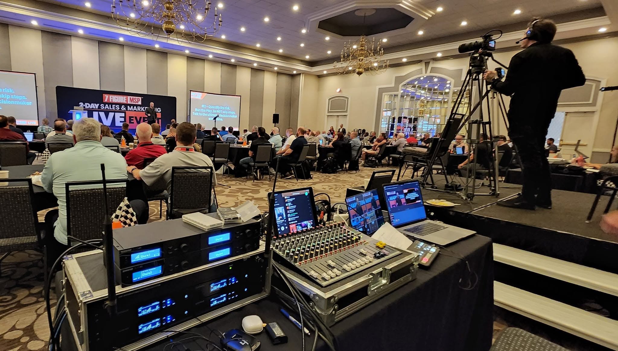 Main stage live event with full ballroom audience and multi-camera broadcast production