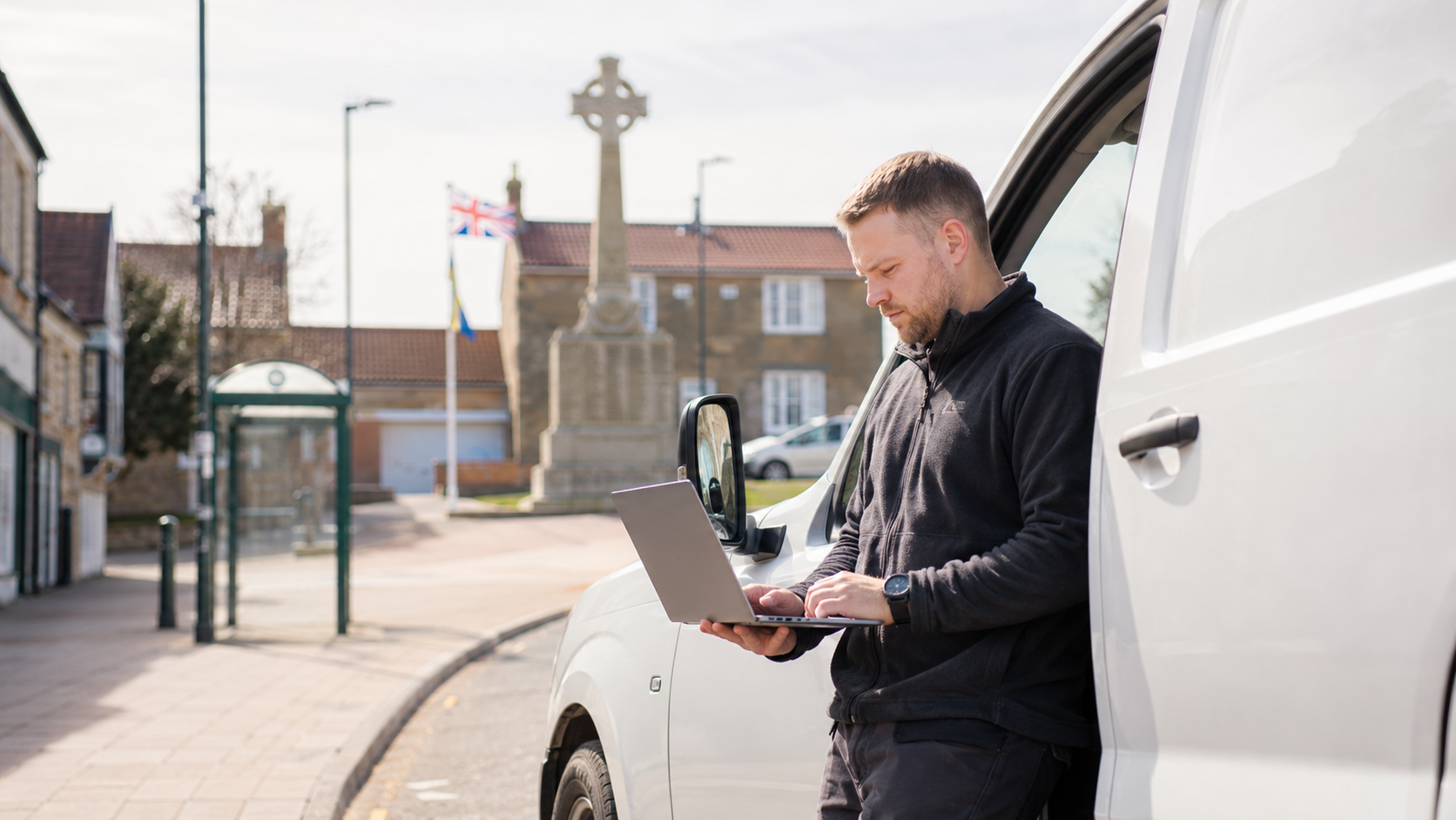 Bedlington business owner working near cross
