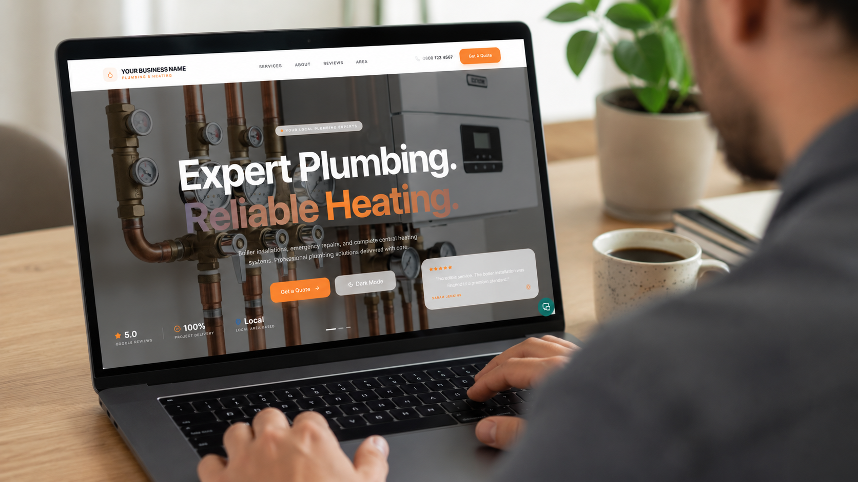 Modern plumbing and heating website design shown on a laptop screen
