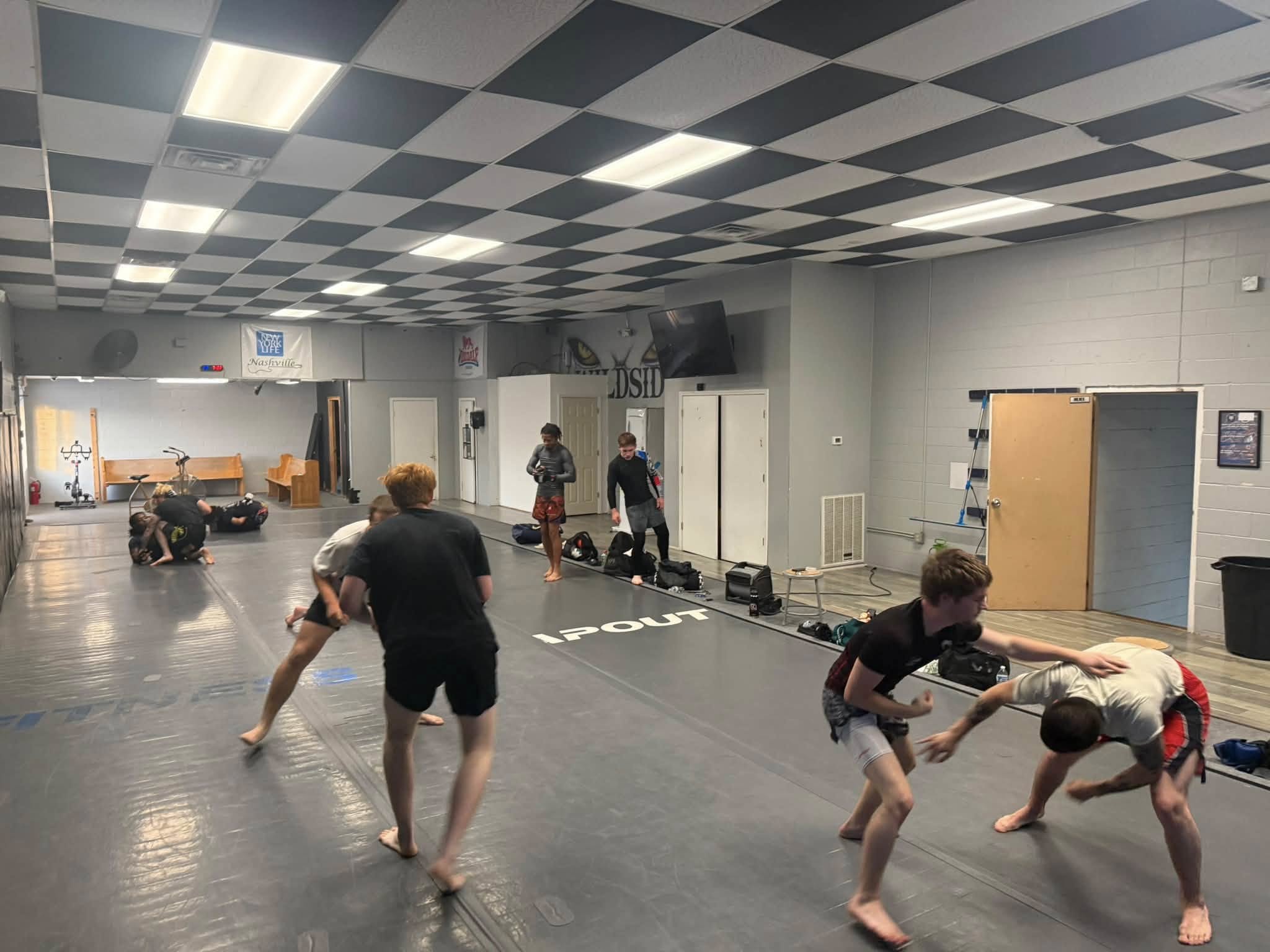 Wrestling Clarksville TN Wildside — takedown drilling on the mats