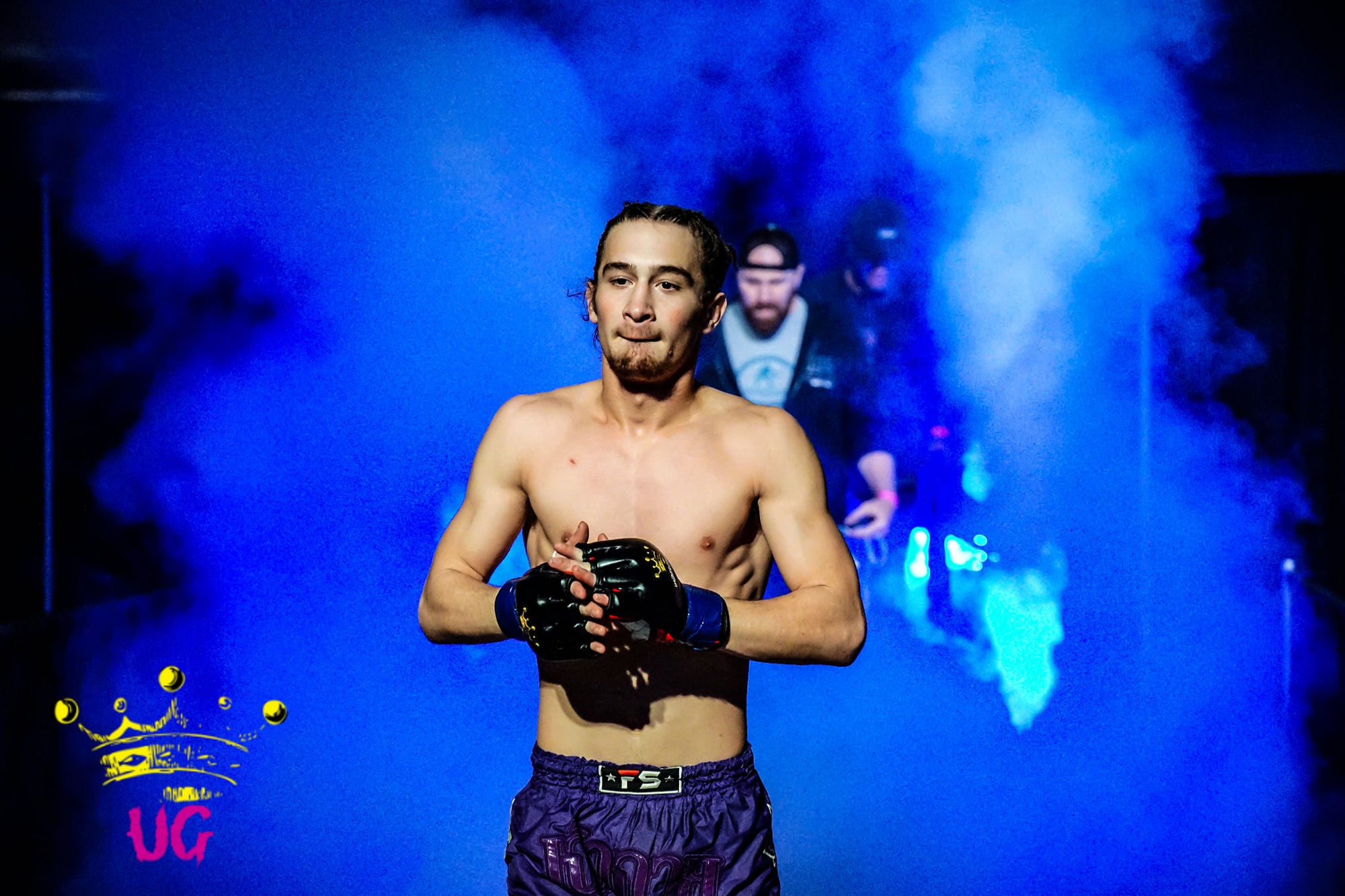 MMA Walkout Clarksville TN Wildside — Wildside fighter entering the cage under blue lights