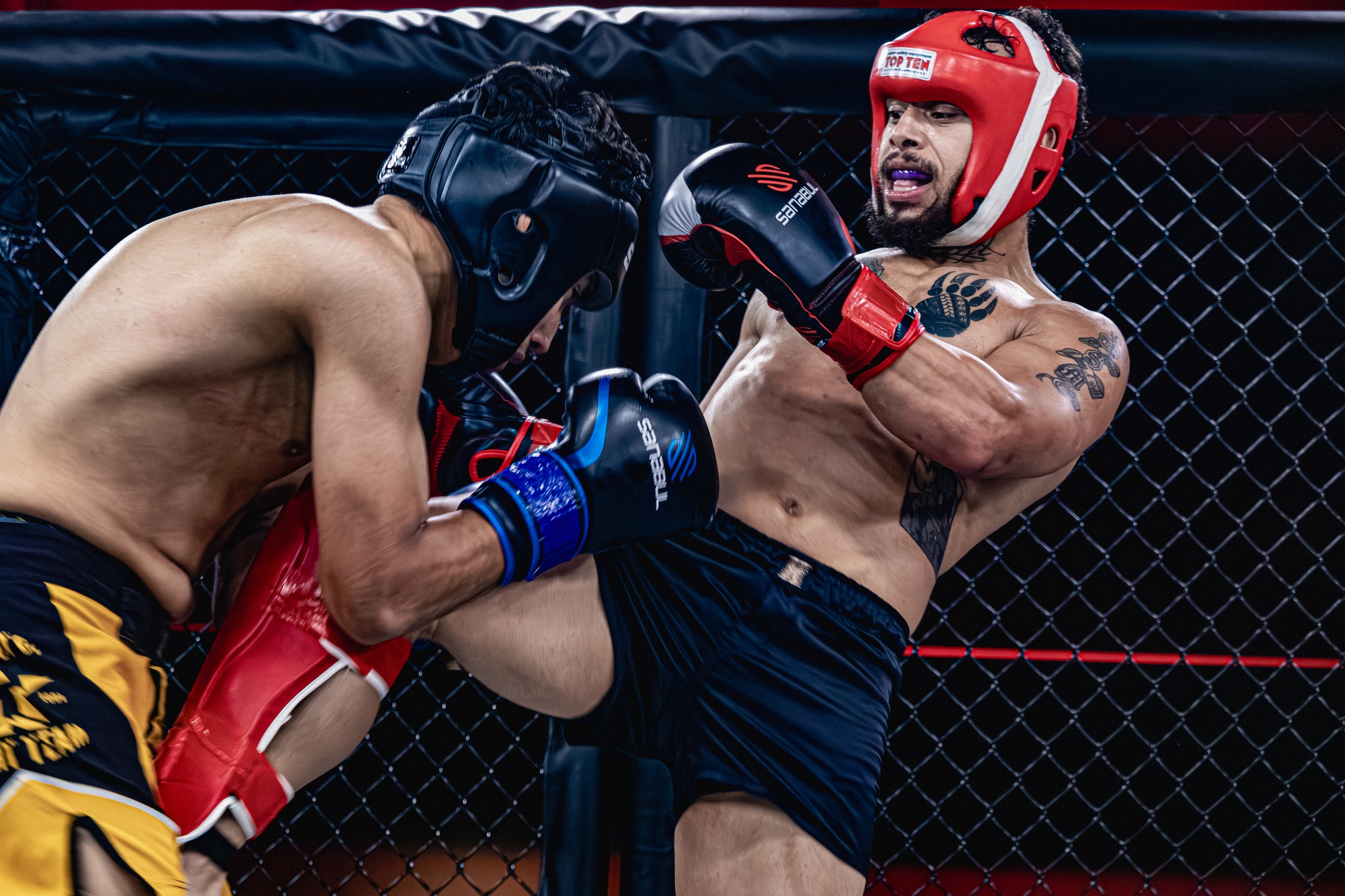 Striking Training Clarksville TN Wildside — High-intensity leg kick drilling in the cage