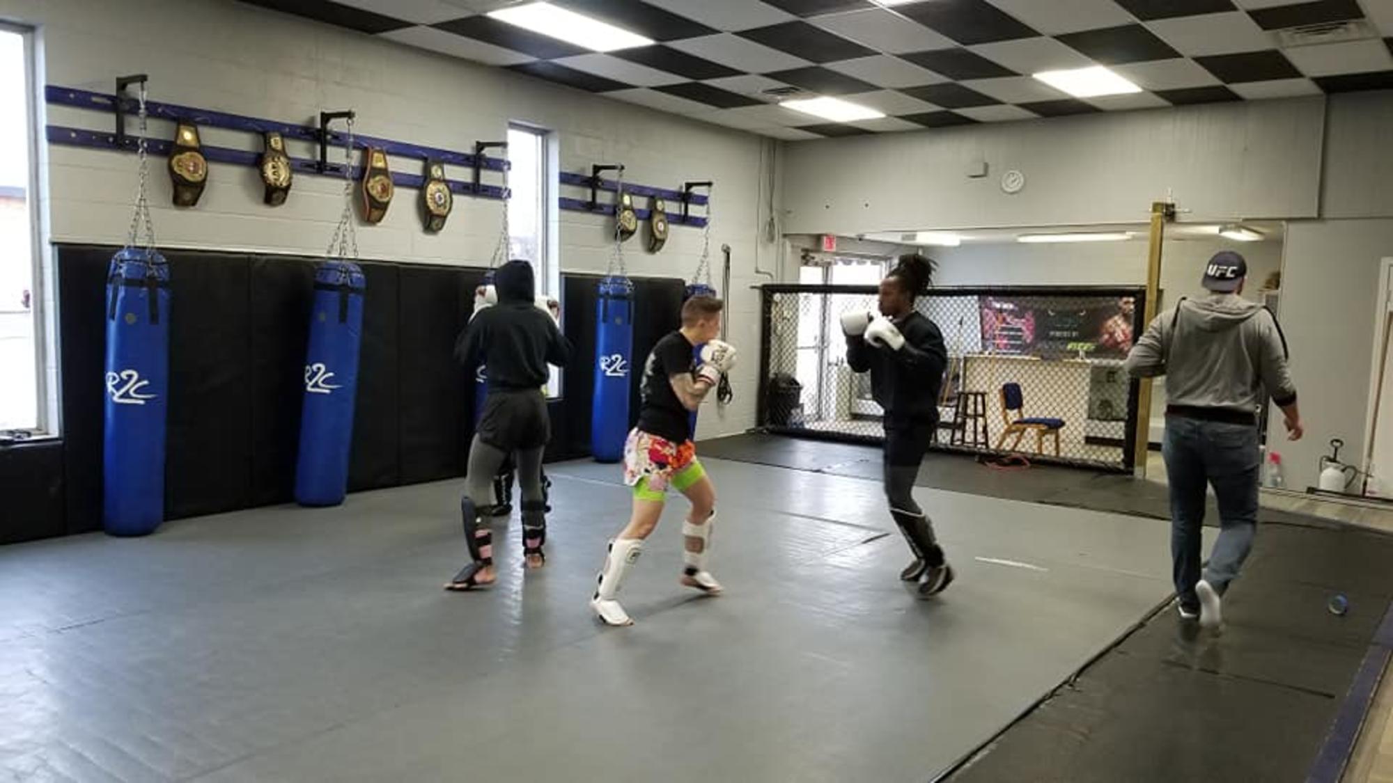 Striking Training Clarksville TN Wildside — students drilling boxing and kickboxing on the mats