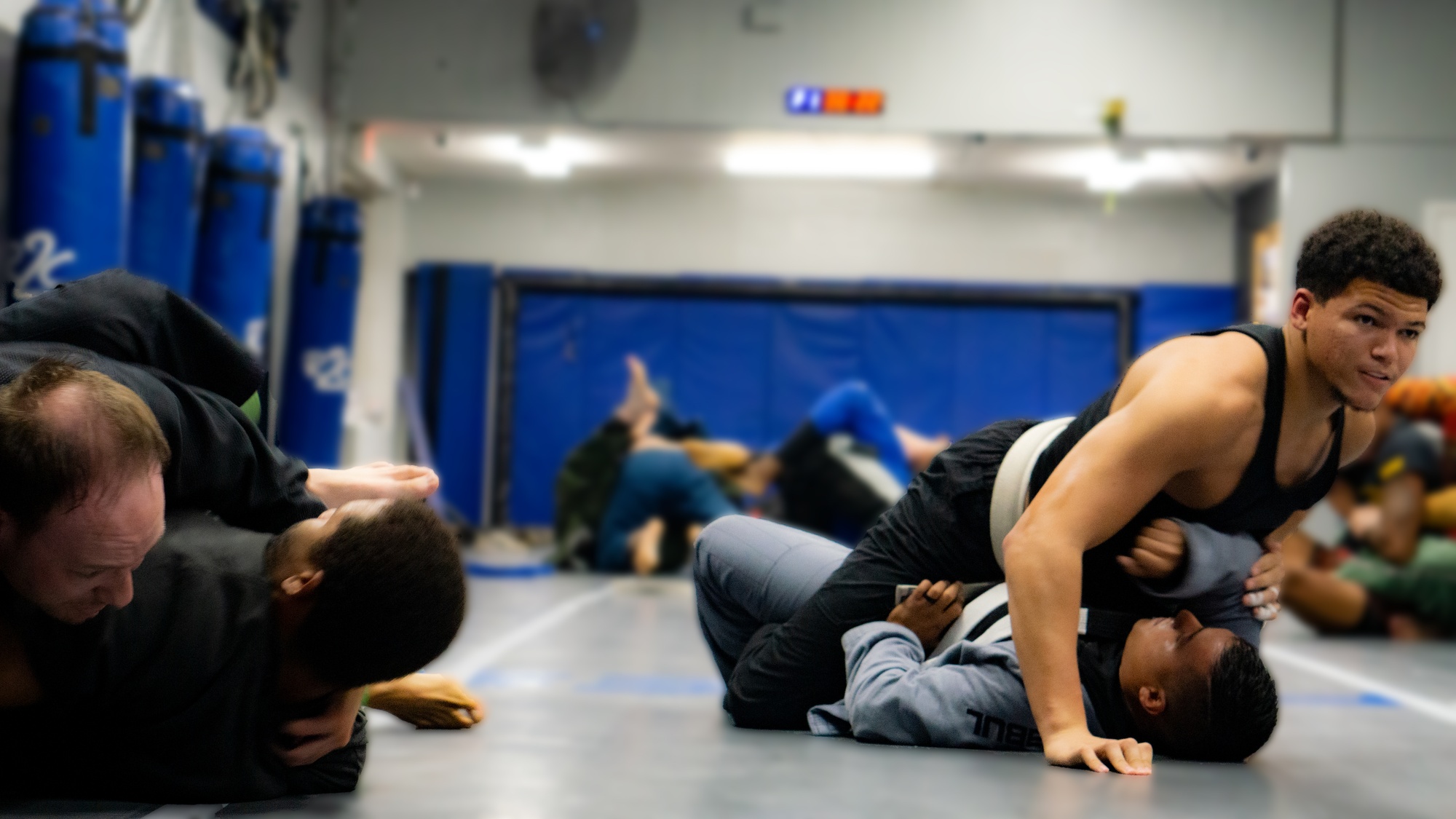 BJJ Training Clarksville TN Wildside — close up of technical grappling on the mats