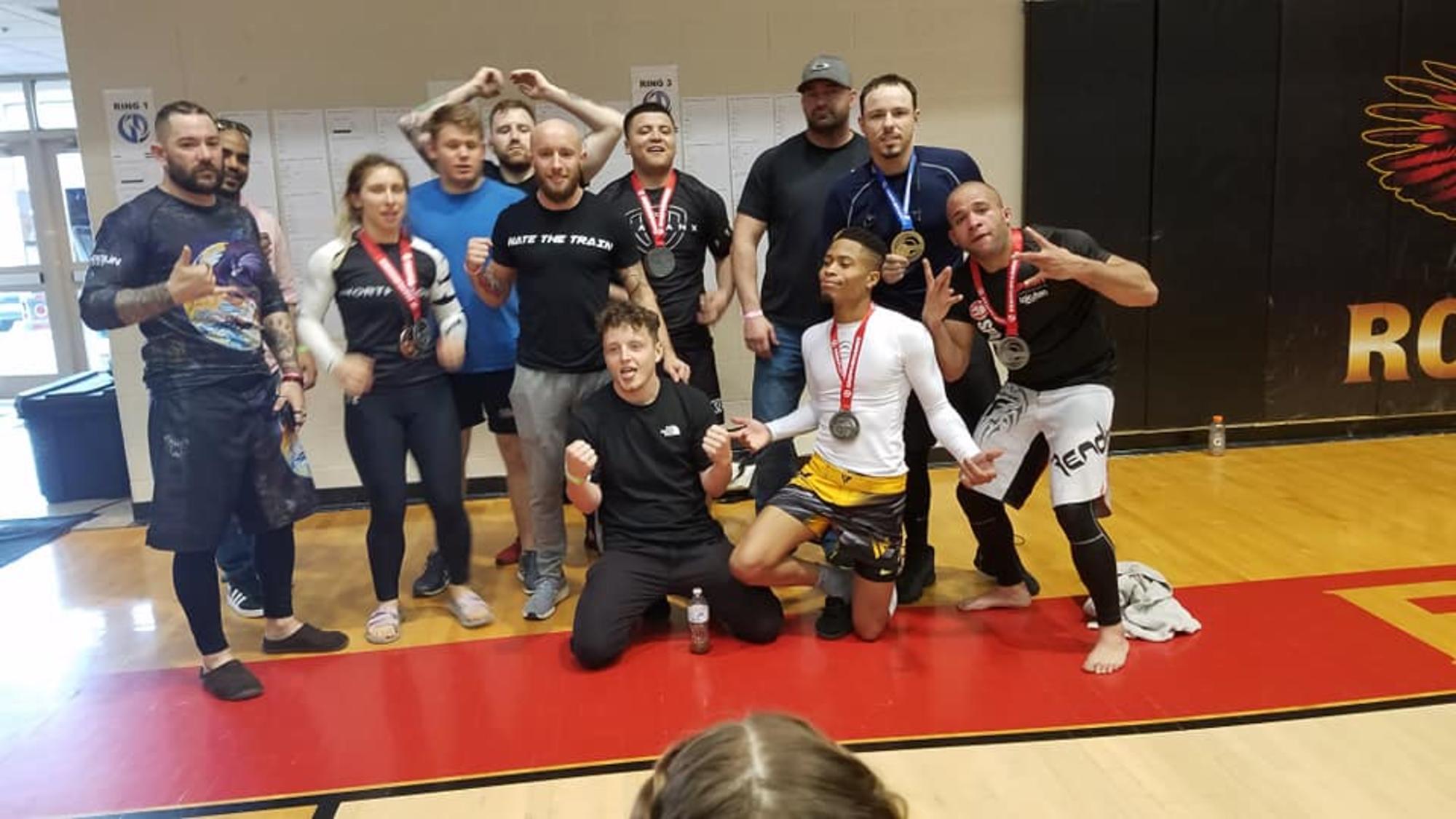 Combat Sports Tournament Clarksville TN Wildside — large group of Wildside students with medals at a regional event