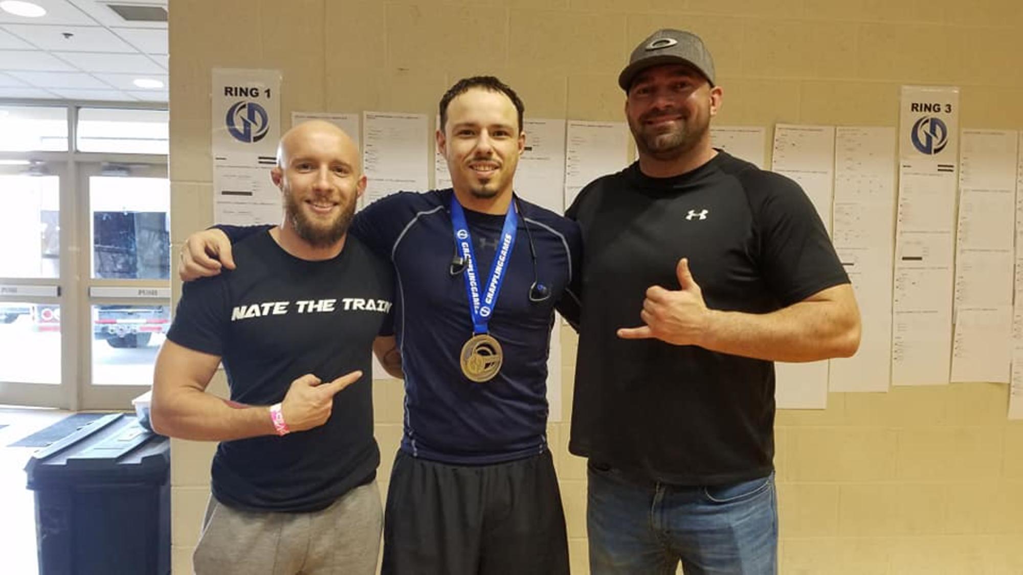 Martial Arts Tournament Clarksville TN Wildside — Wildside students and coaches with a gold medal