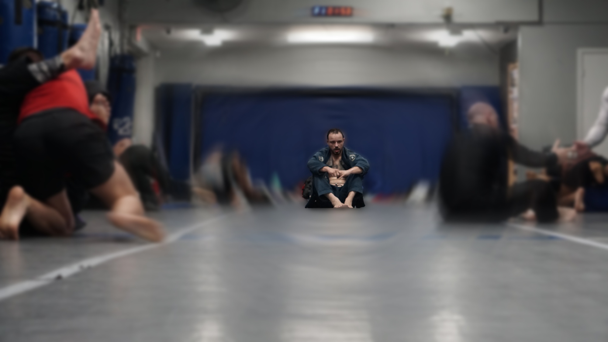 Gi Jiu-Jitsu Clarksville TN Wildside — student focused on the mats during training