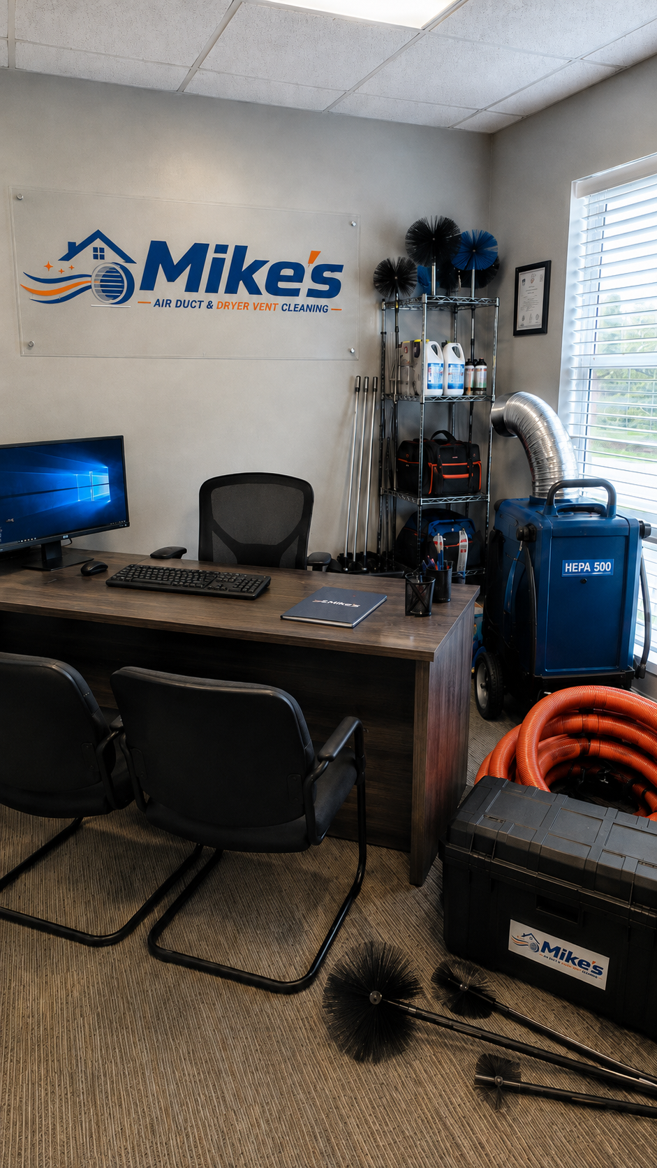 Mike's Air Duct & Dryer Vent Cleaning office interior showing equipment and workspace