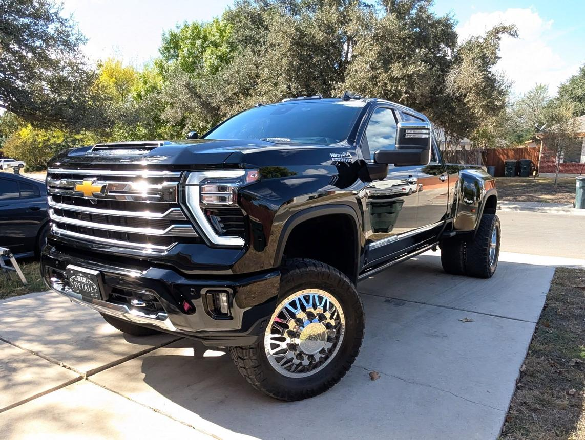 Professionally applied ceramic coating on a black vehicle