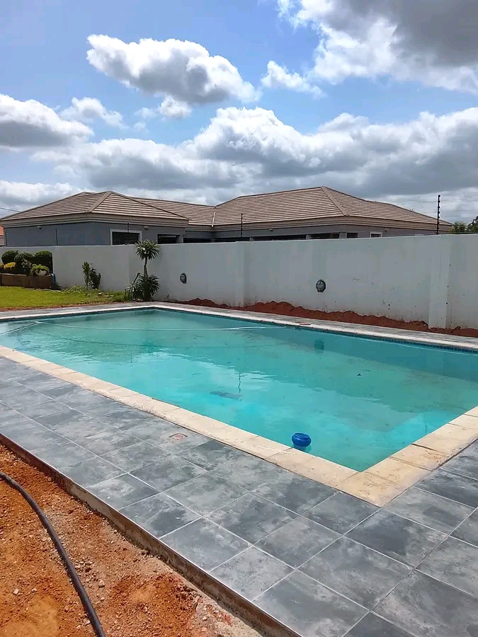 Modern Pool with Grey Tiling