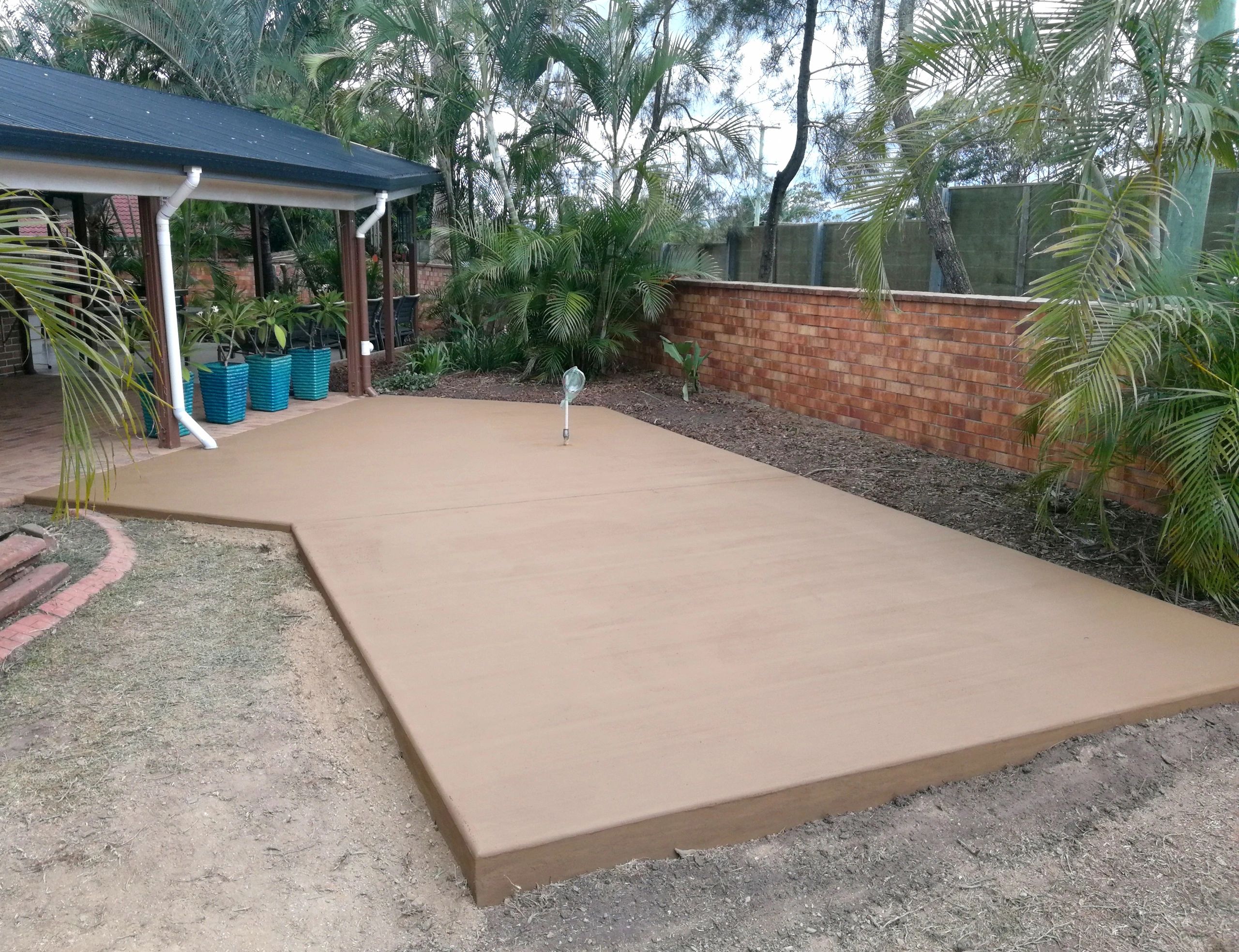 Concrete shed slab Brisbane — garden shed concrete base smooth trowel finish Brisbane