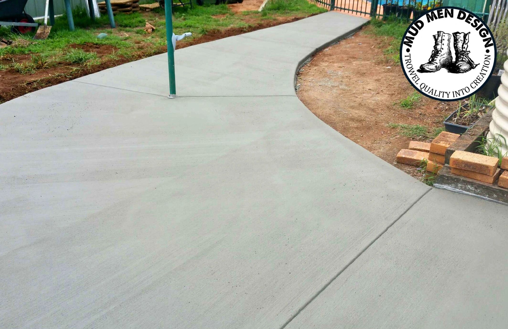 Broom finished residential side access concrete footpath in Brisbane