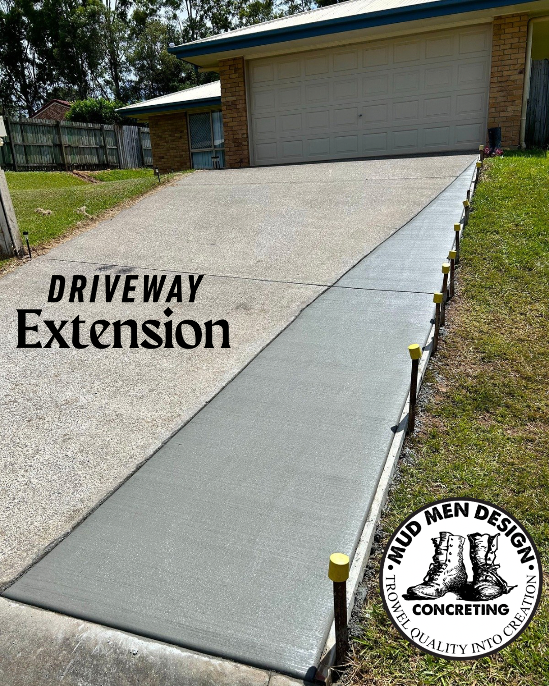 Freshly poured concrete driveway extension with formwork in Brisbane