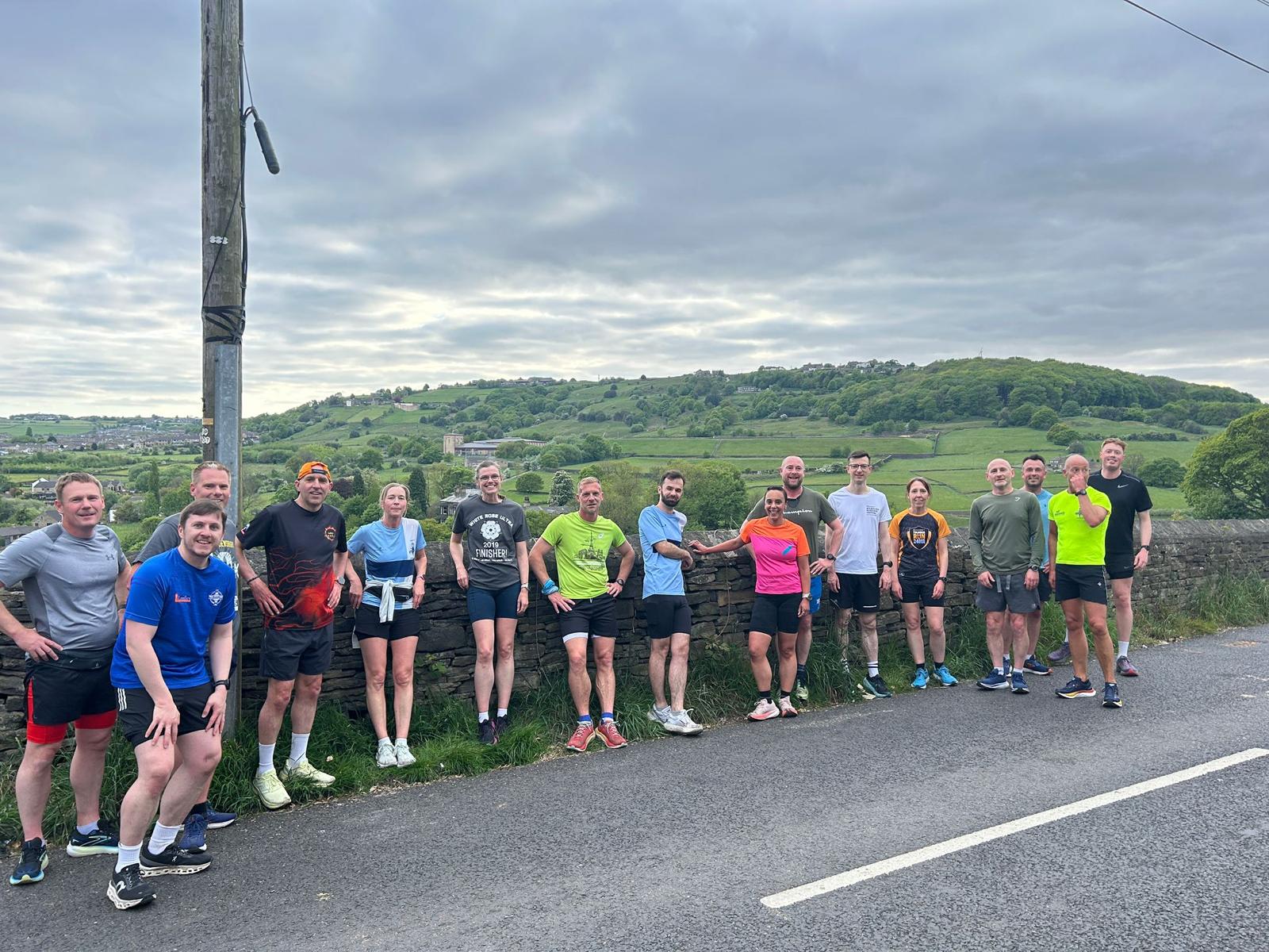 Lindley Running Club members posing together after a group run in Huddersfield