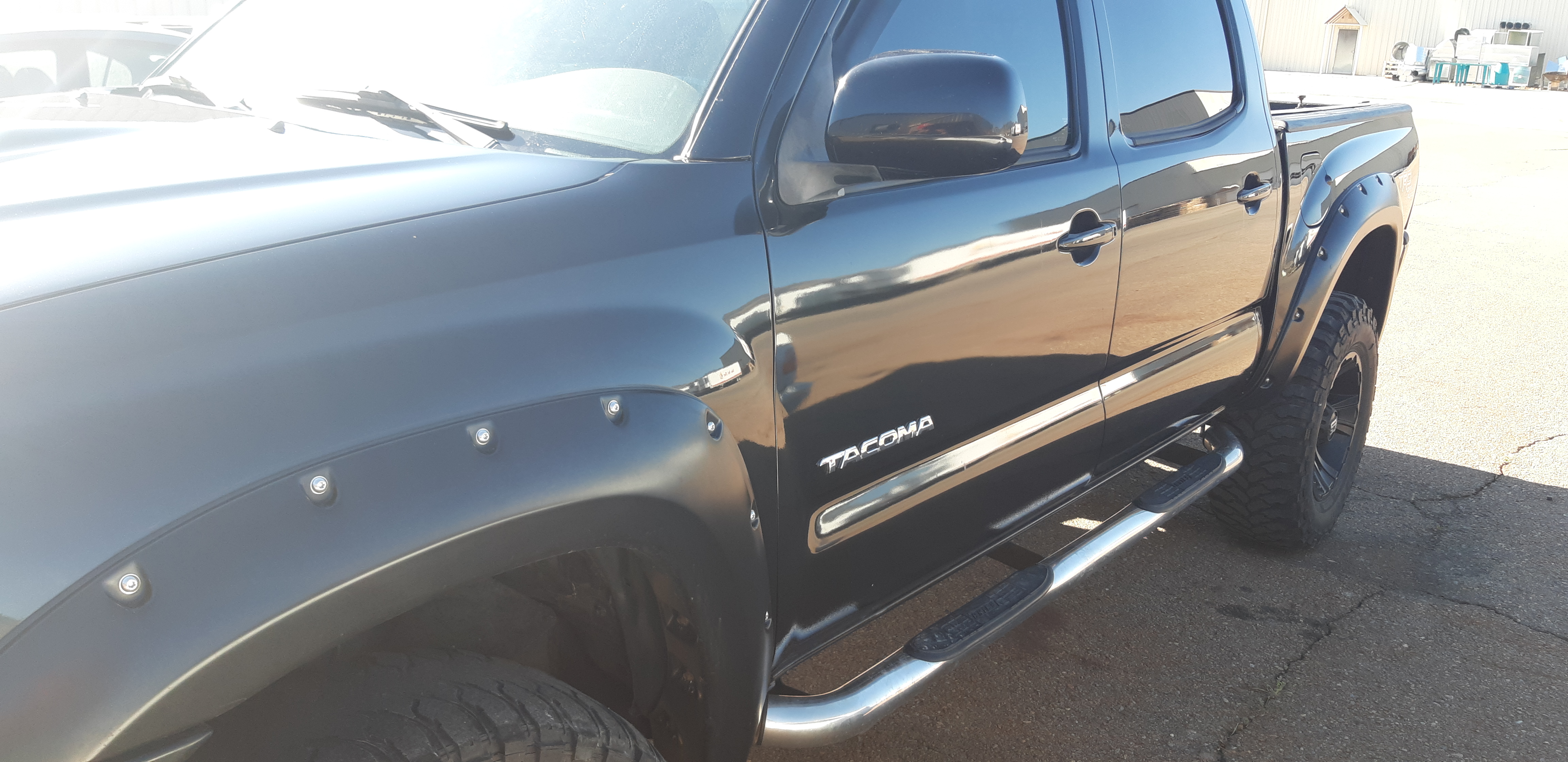 Flawless black paint finish on vehicle - Vito's Body Shop North Logan UT