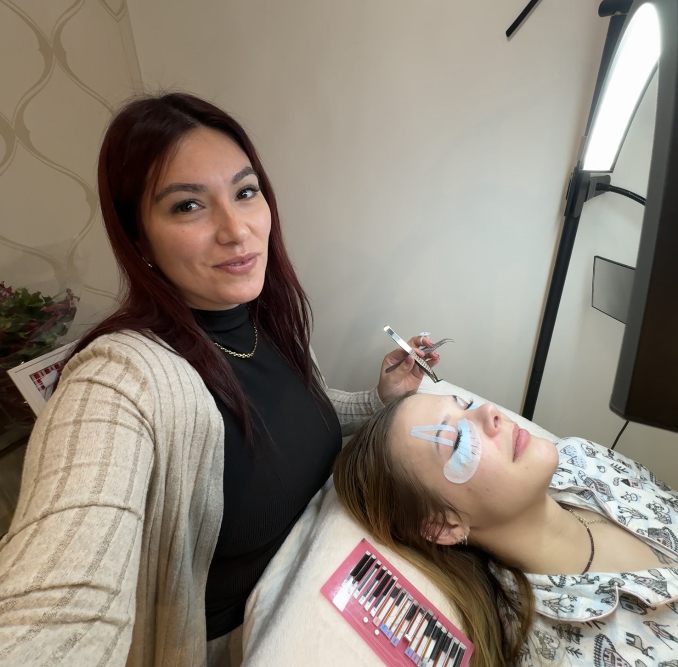 Master lash and wax specialist in treatment room at Kattymooneyes North York