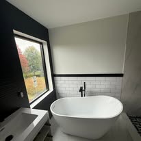 Bathroom remodel with freestanding tub in Woodbury, MN by High Quality Plumbing