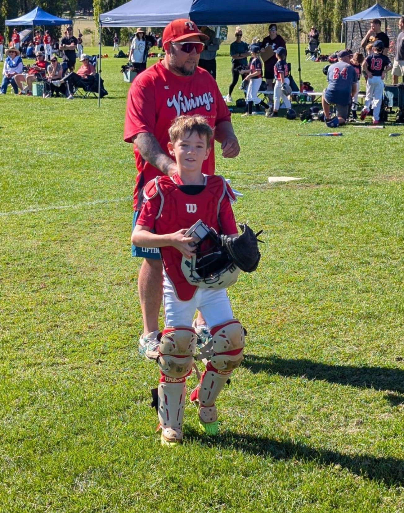 Vikings catcher with coach