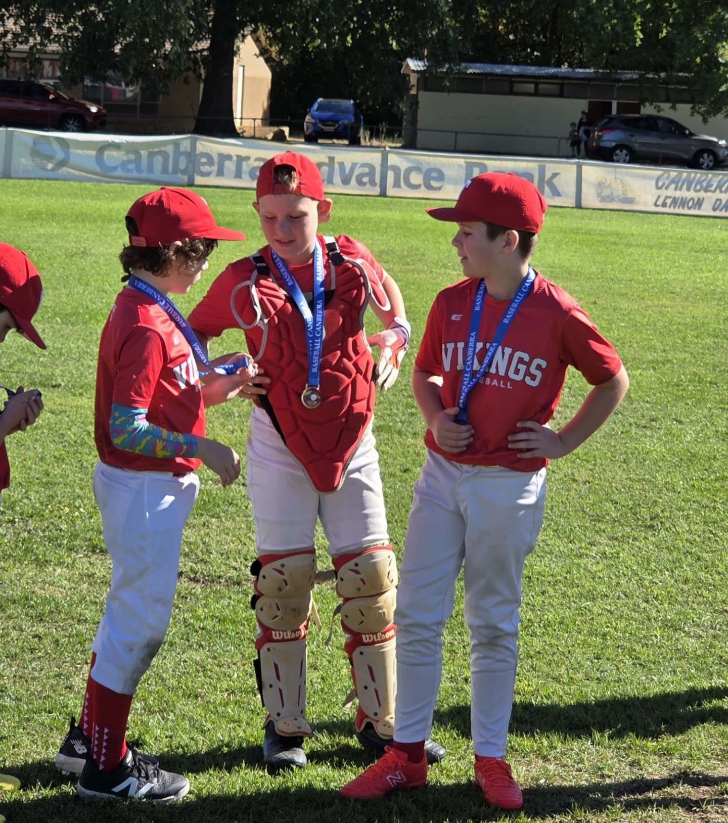 Vikings Juniors in uniform with championship medals