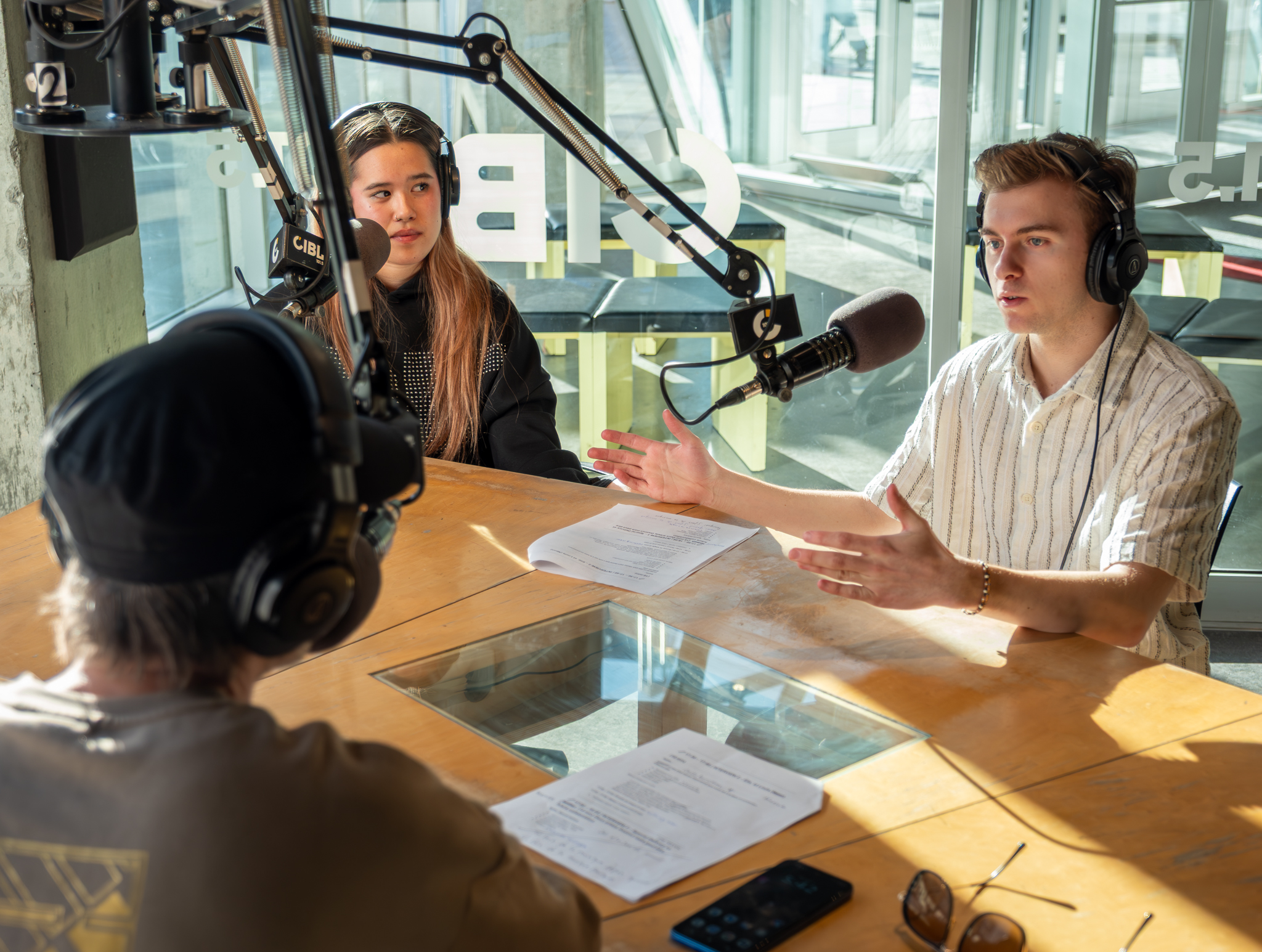 Musitechnic alumni working in a professional recording studio