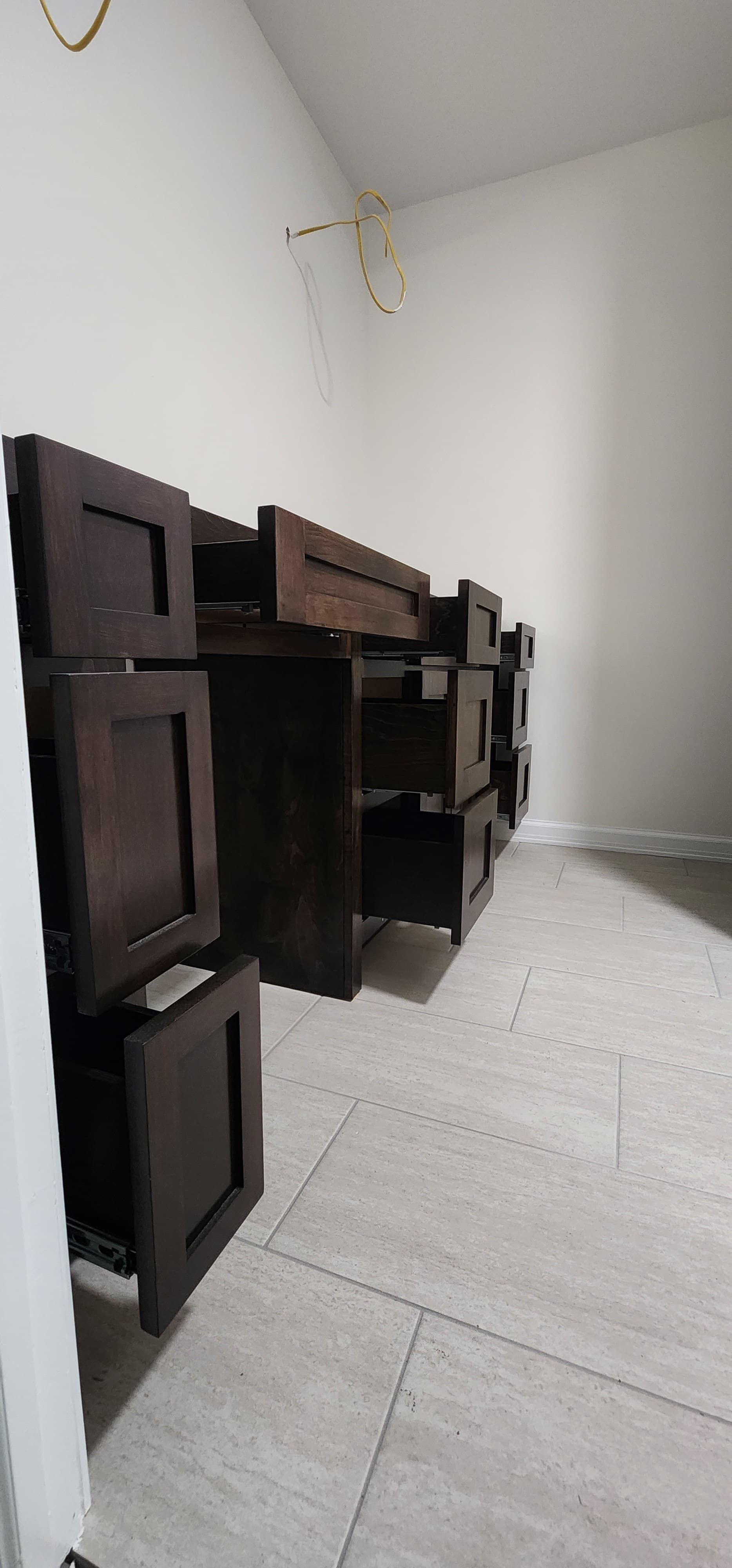 Handcrafted dovetail soft-close drawers stained in rich espresso