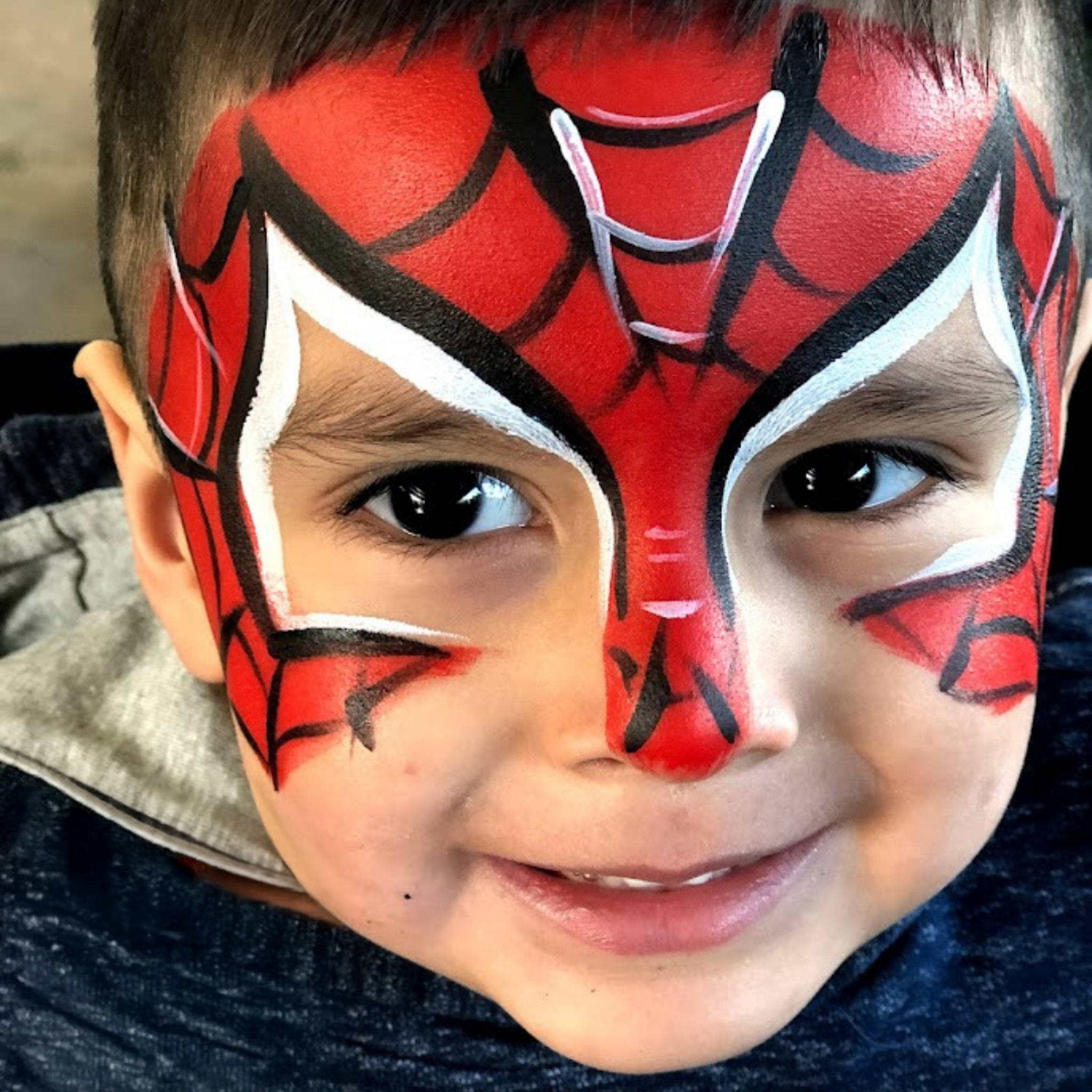 Face painting fun at a children's party in Houston TX